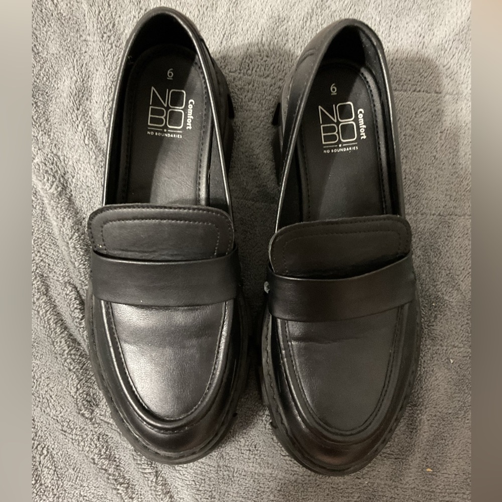 Cute platform slid in shoes .